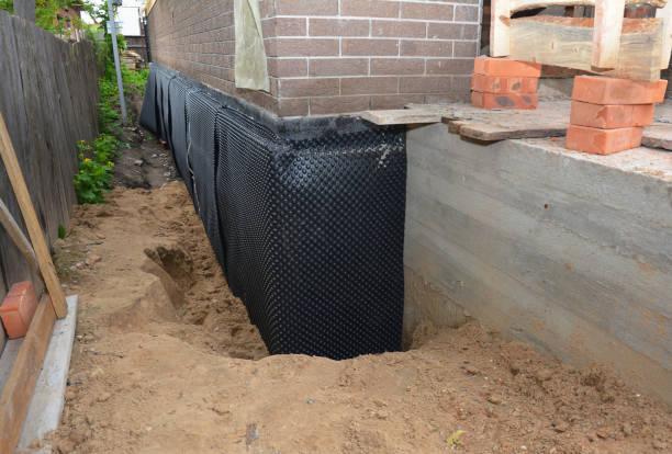 Happy homeowners after waterproofing job in McCutchenville